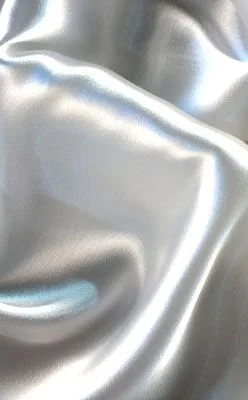 Close-up of shiny, smooth satin fabric with light reflections and gentle folds
