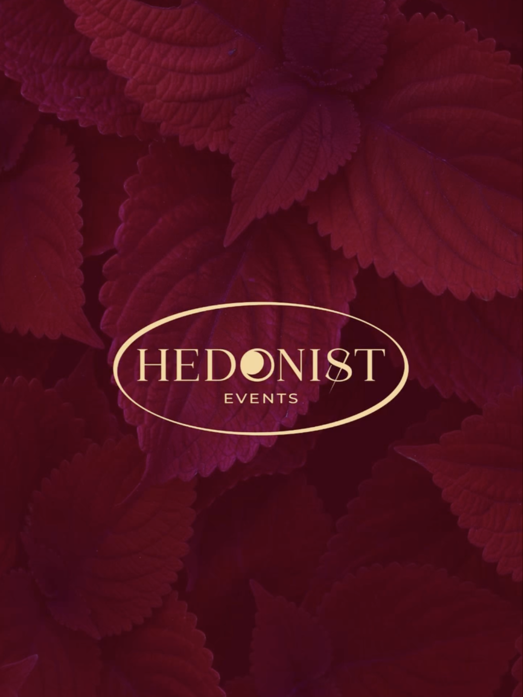 Dark red leaves with a gold oval logo in the center that reads 'HEDONIST EVENTS'.