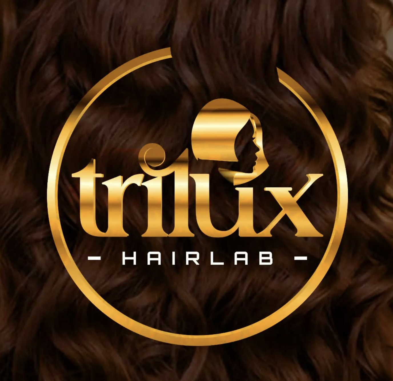 Logo for Trillx Hair Lab with a gold circular border, a gold silhouette of a woman's side face, and stylized gold text on a background of curly brown hair.