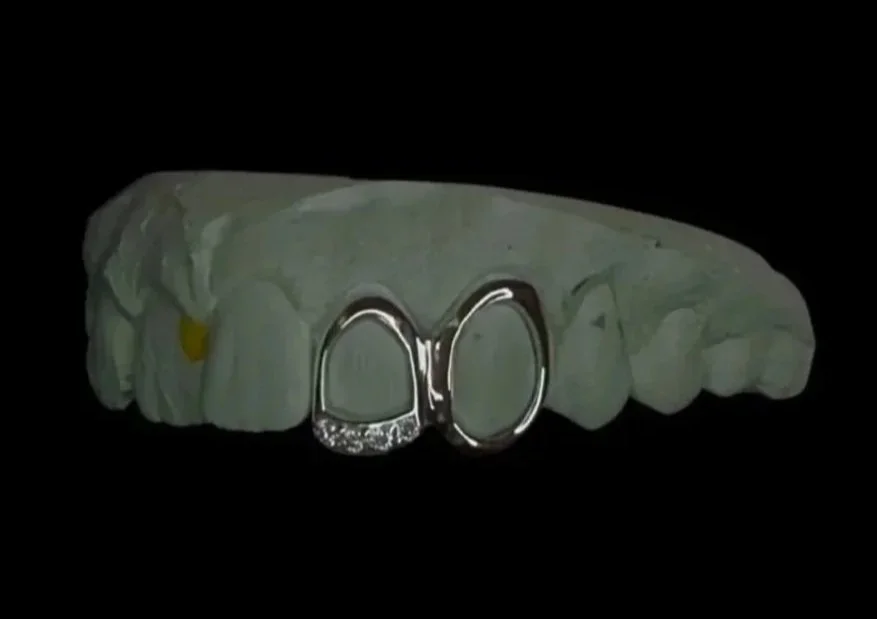 Custom silver grillz with diamond bar. 2 piece grillz in portland, OR