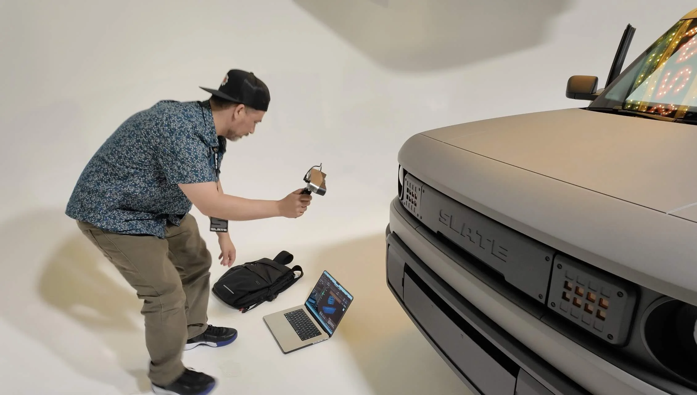 prepping to 3d scan the blank slate ev truck with the revopoint pop4