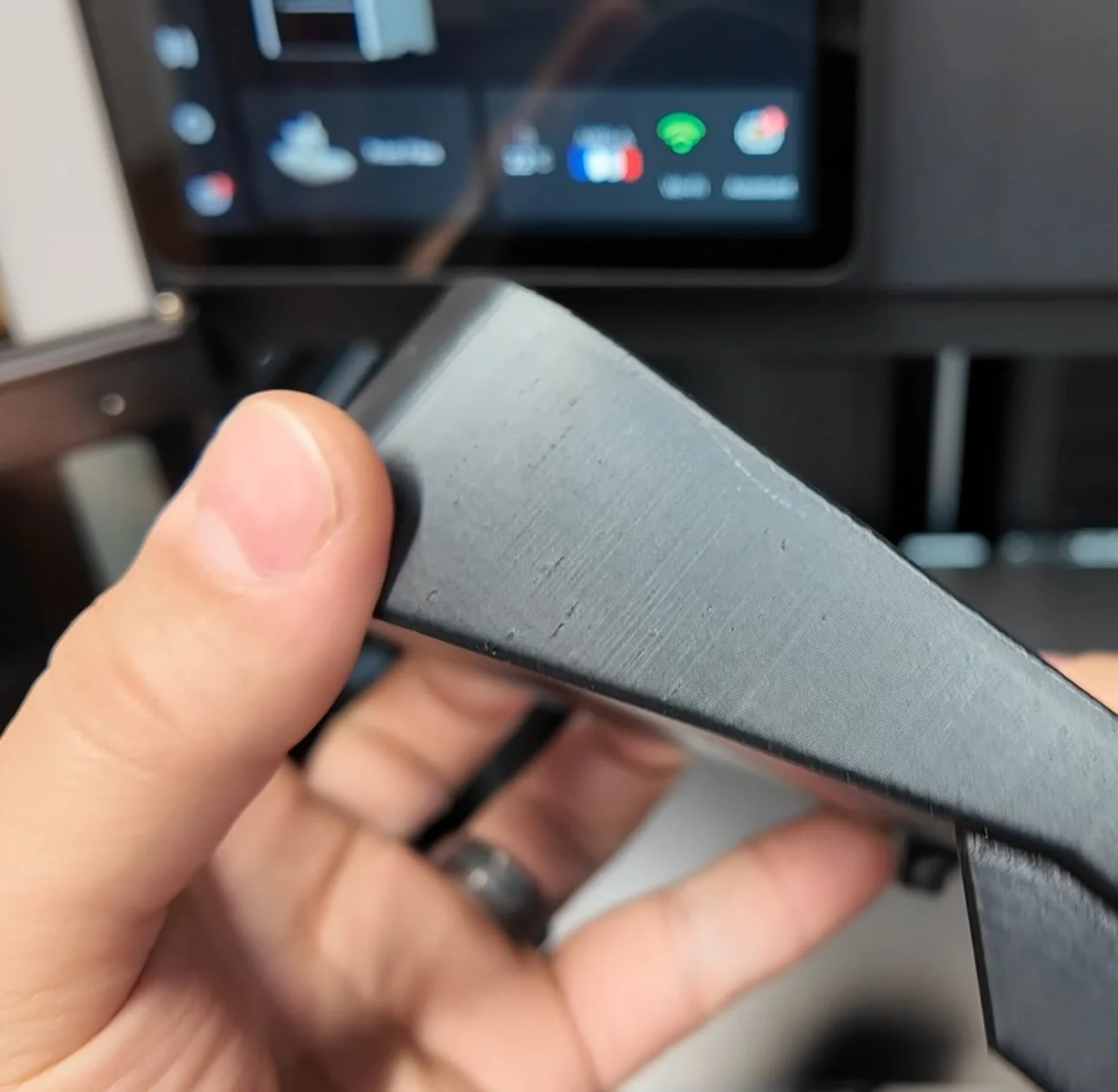 A 3d printed car part with layer lines