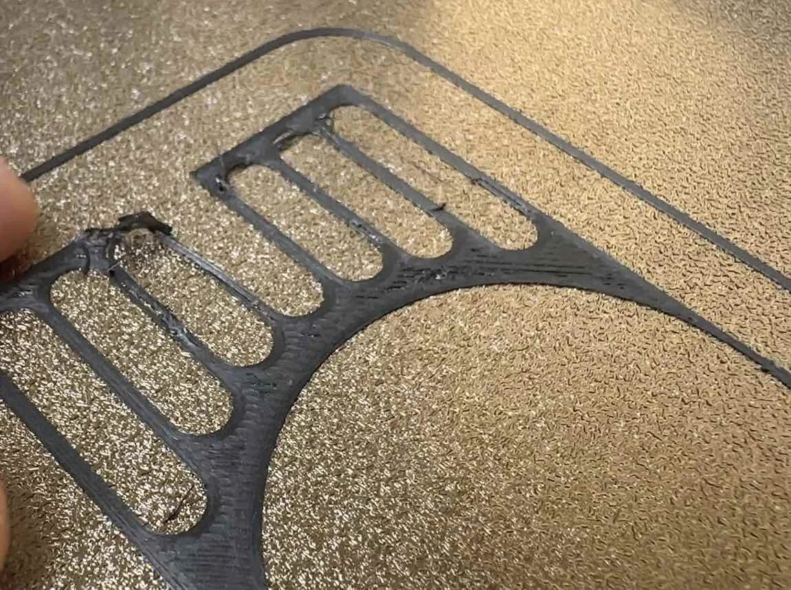 filament warping off build plate