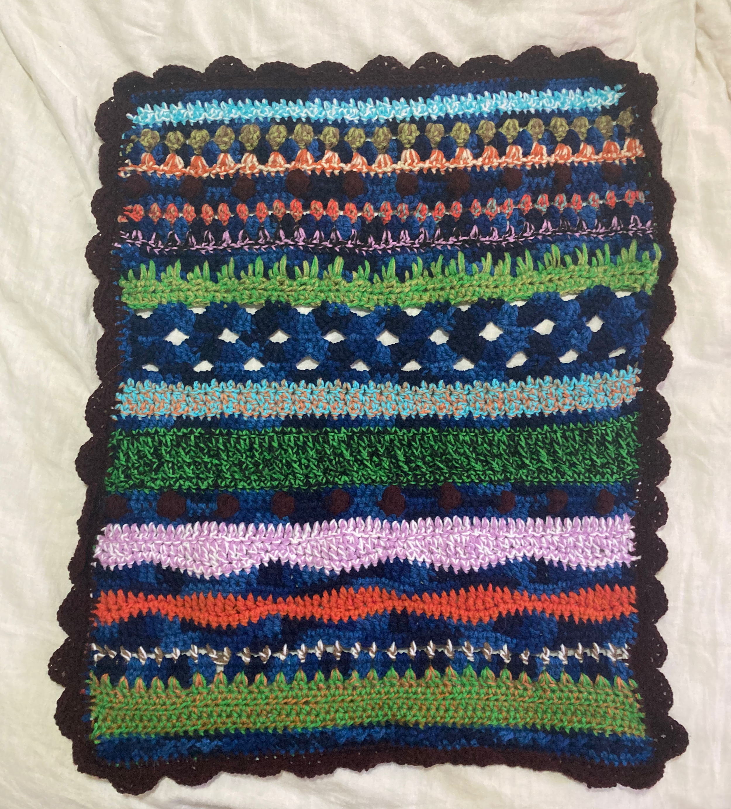 baby blanket for theo | made in july 2022 |

modified happy scrappy crochet-a-long pattern by hookedME with scalloped edge