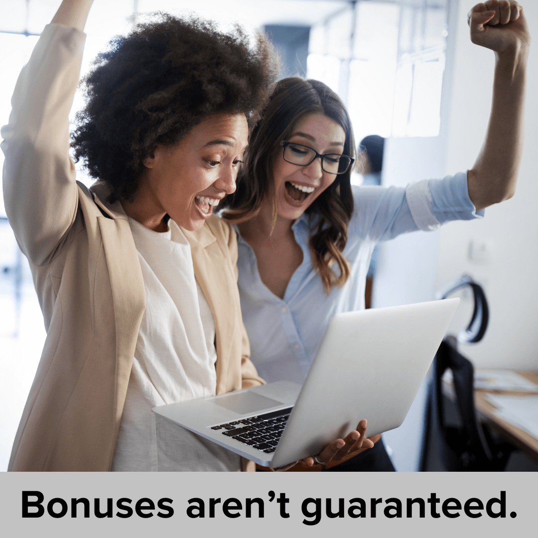 Photo of two women in a workplace setting looking at a laptop together and cheering. The title at the bottom in black font says: Bonuses aren't guaranteed.