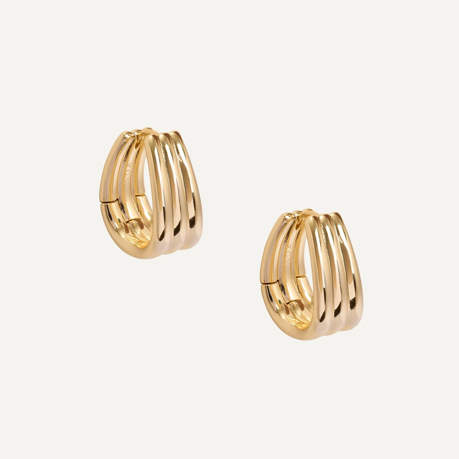 fotografia ecommerce, fotografia joyas, fondo blanco, aros de oro 