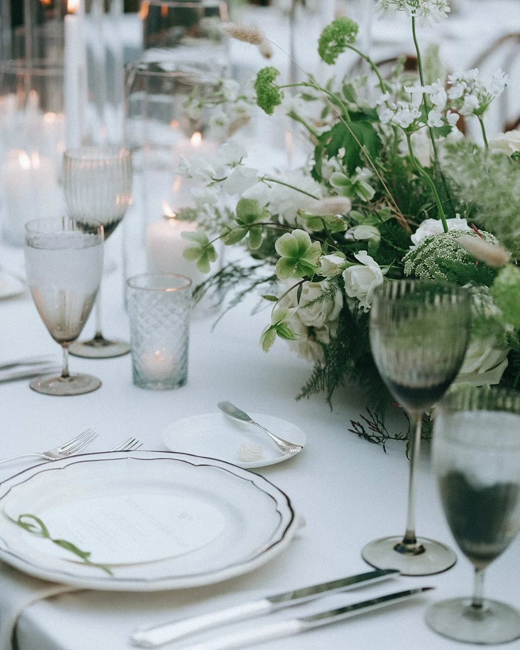 Step into a scene pulled from a storybook &mdash; where time slows, candles flicker, and love blooms like an English garden in June (except this time it was in March) ✨🌿

From hand-tied seating cards to romantic table settings, every detail was desi