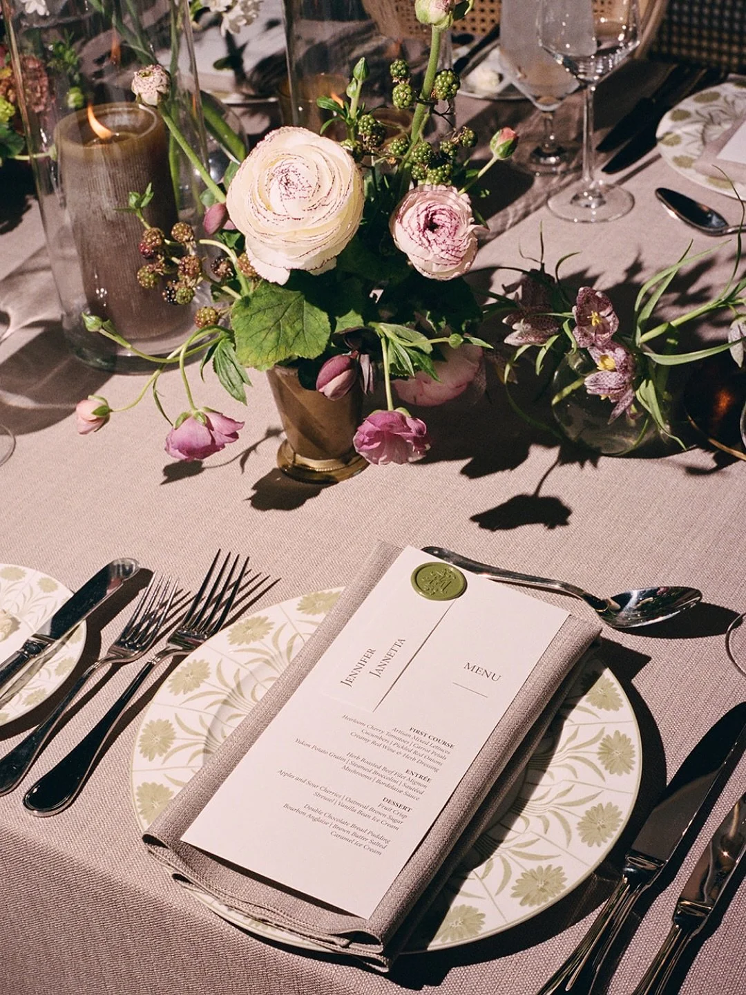 A glimpse into the evening &mdash; one of my favorite parts of the day.

The flash photos from later that night captured the essence of their reception: the glow of candles on the tables, the soft shimmer of glassware, and the way Maggie&rsquo;s veil
