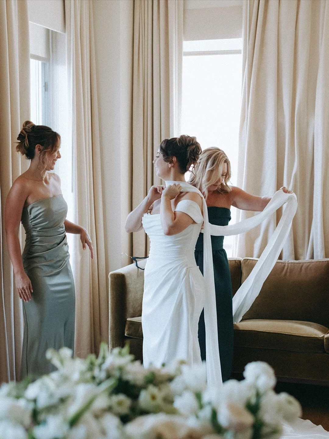 The start of the day always feels like a story waiting to unfold. These photos capture that feeling so beautifully &mdash; the morning light in Charleston, the dresses hanging by the window, and the view of the Ravenel Bridge in the distance.

From g