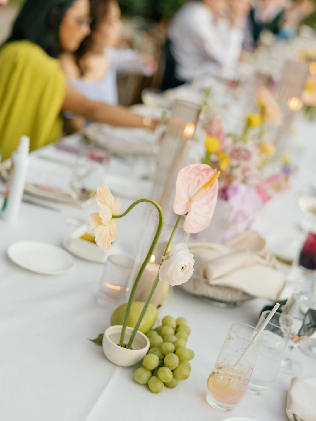 The dinner that night felt like something out of a dream &mdash; intimate, glowing, and full of life.

Greens, oranges, and golds wove through the tablescape, accented by candlelight and flowing wine. The mix of Prosecco, laughter, and good conversat