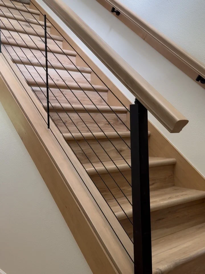Just finished this new staircase and cable railing from @cablebullet What a transformation! If you’re ready to love your home again, reach out now to book us for fall! #remodel #staircases #cablerailing #carpentry #albanyoregon #craftnotcrap