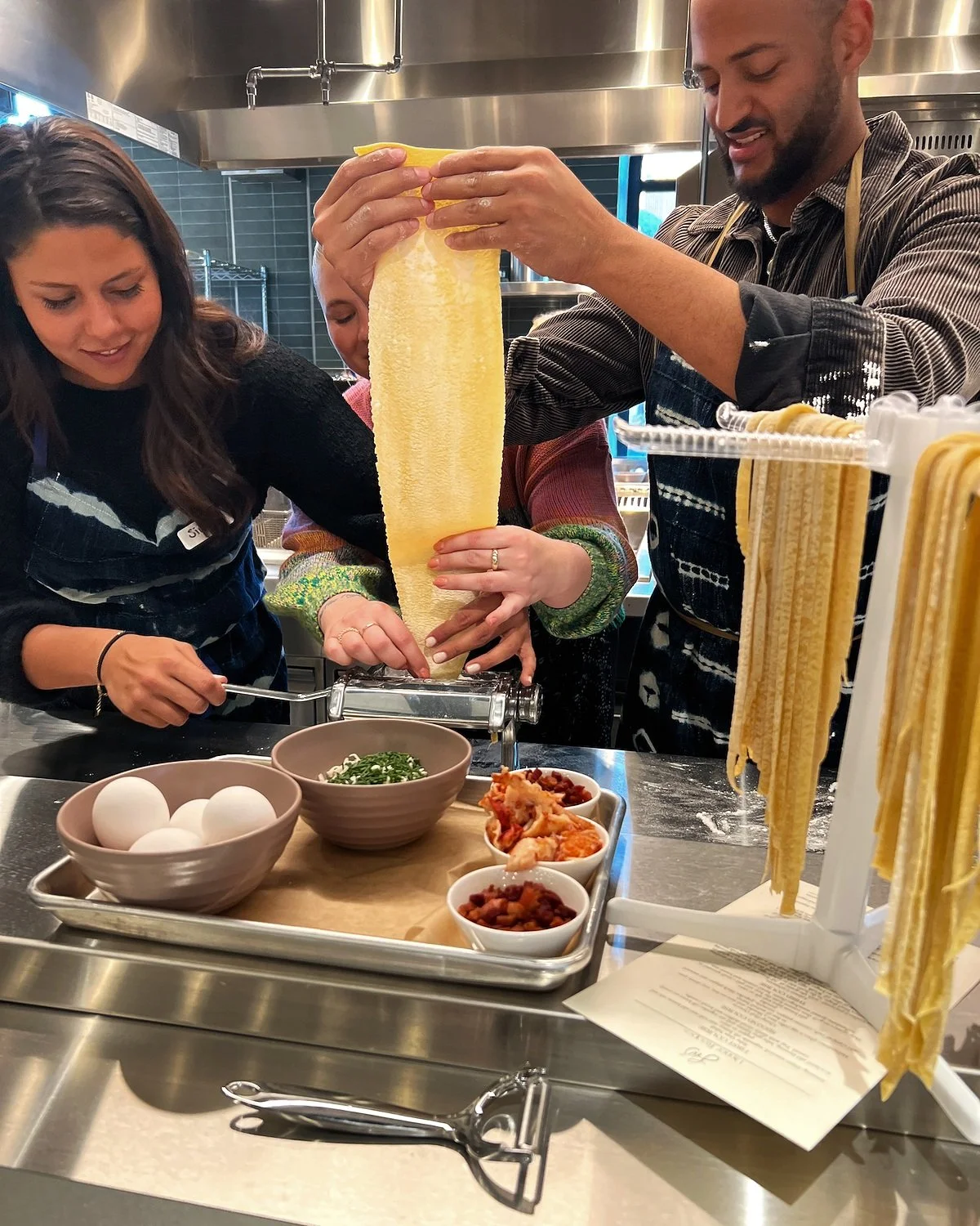 Participants at Locali Seasoned pasta-making class