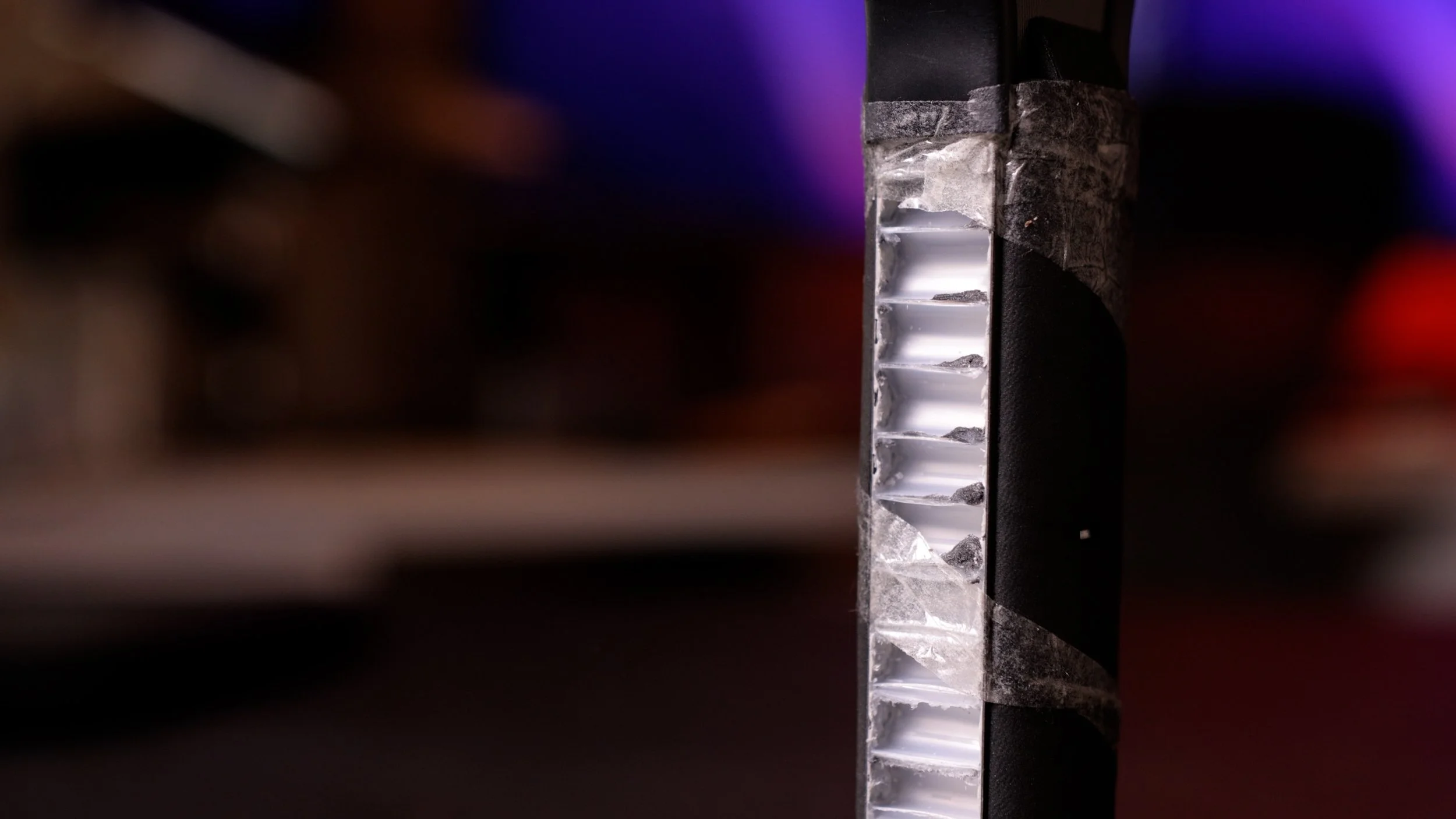 Franklin Carbon STK pickleball paddle cross-section showing exposed polymer honeycomb core