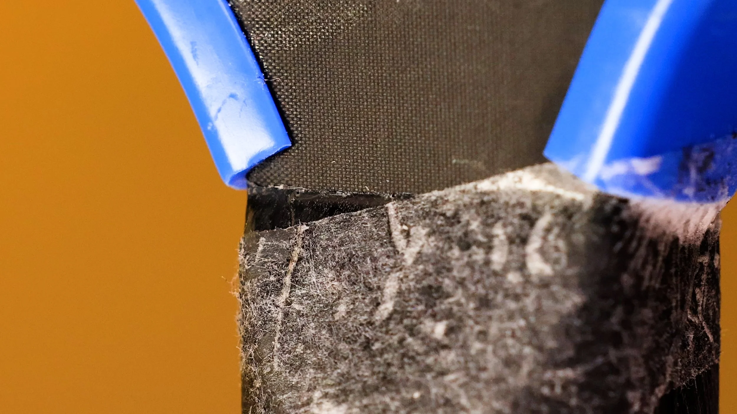 Electrum Model E Elite pickleball paddle handle-to-face junction showing non-unibody construction