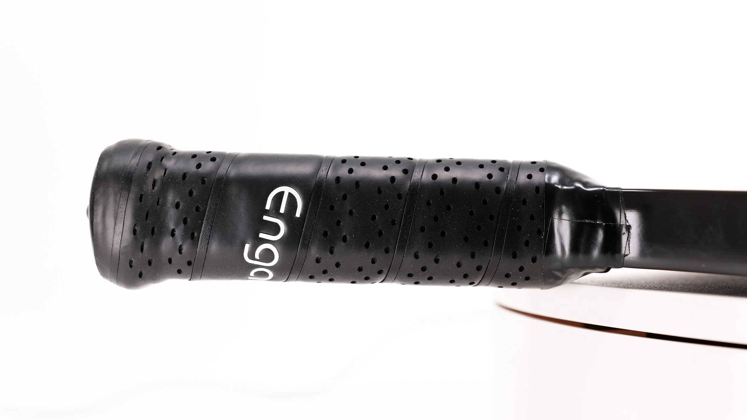 Engage Pursuit Ultra pickleball paddle handle close-up showing branded grip and butt cap