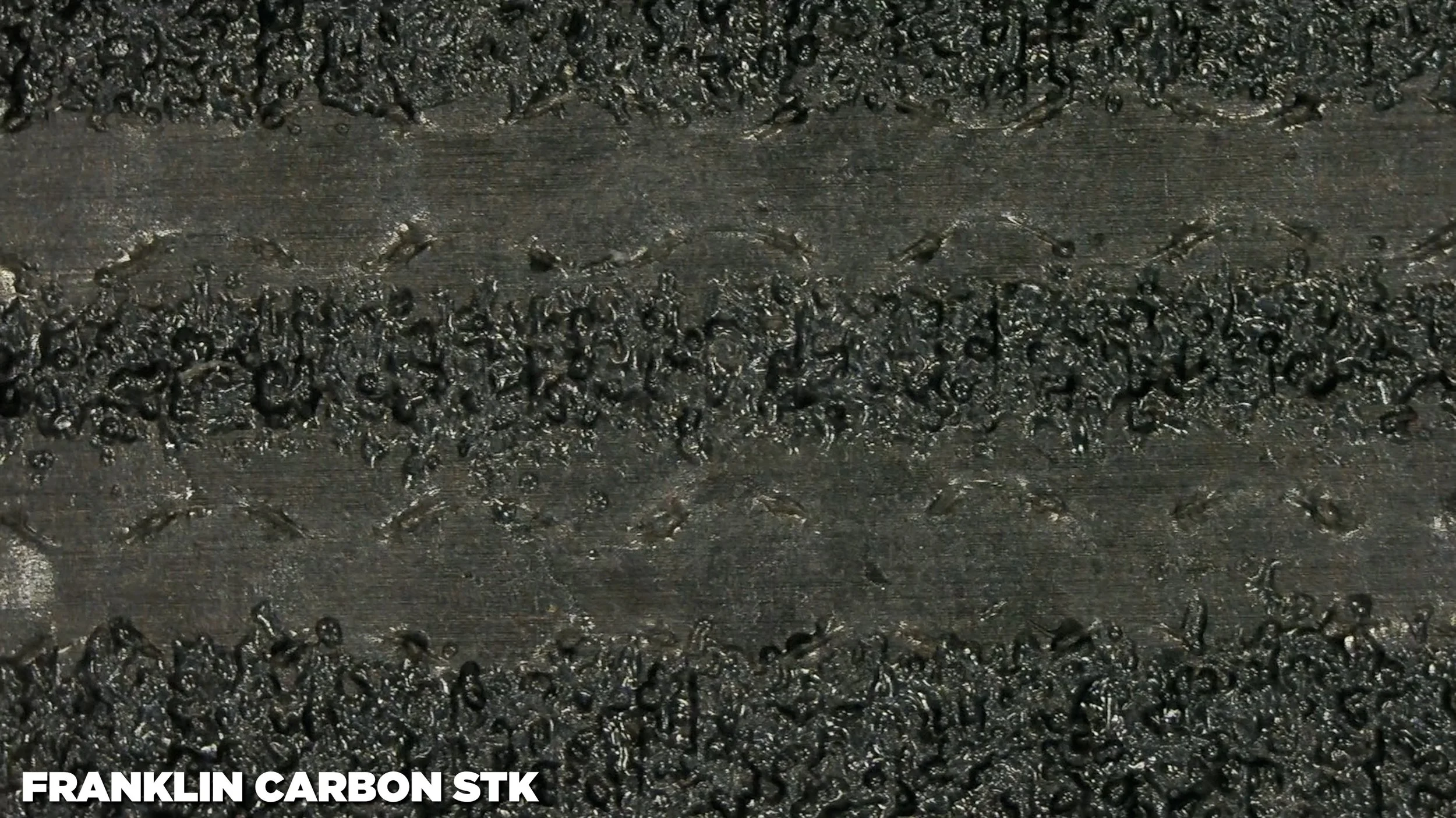 Franklin Carbon STK pickleball paddle face texture macro showing unique surface grit pattern