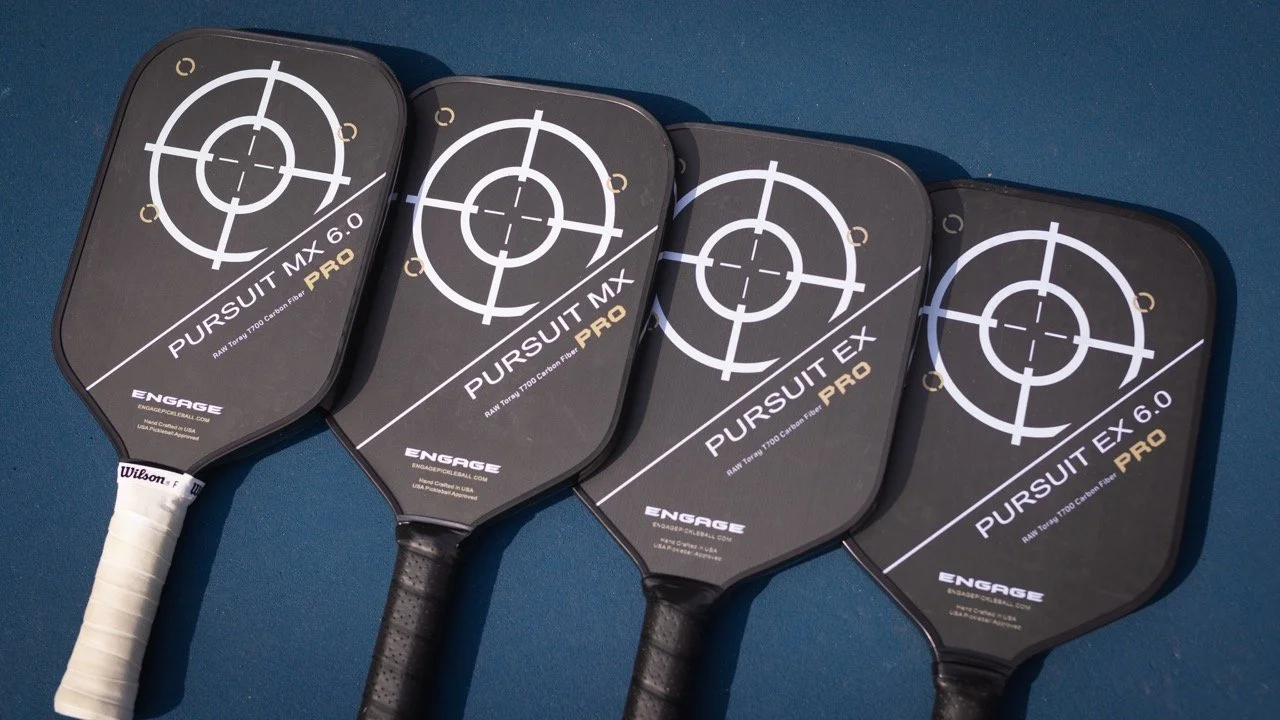 Four Engage Pursuit Pro pickleball paddles in MX 6.0, MX, EX, and EX 6.0 shapes side by side