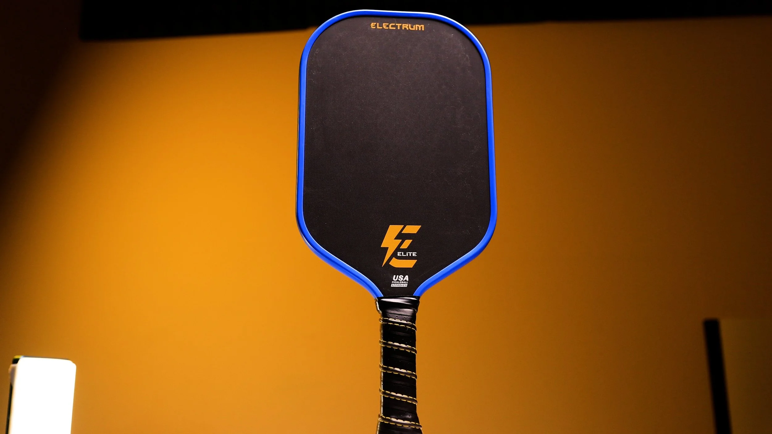 Electrum Model E Elite pickleball paddle full front view showing standard shape and blue trim
