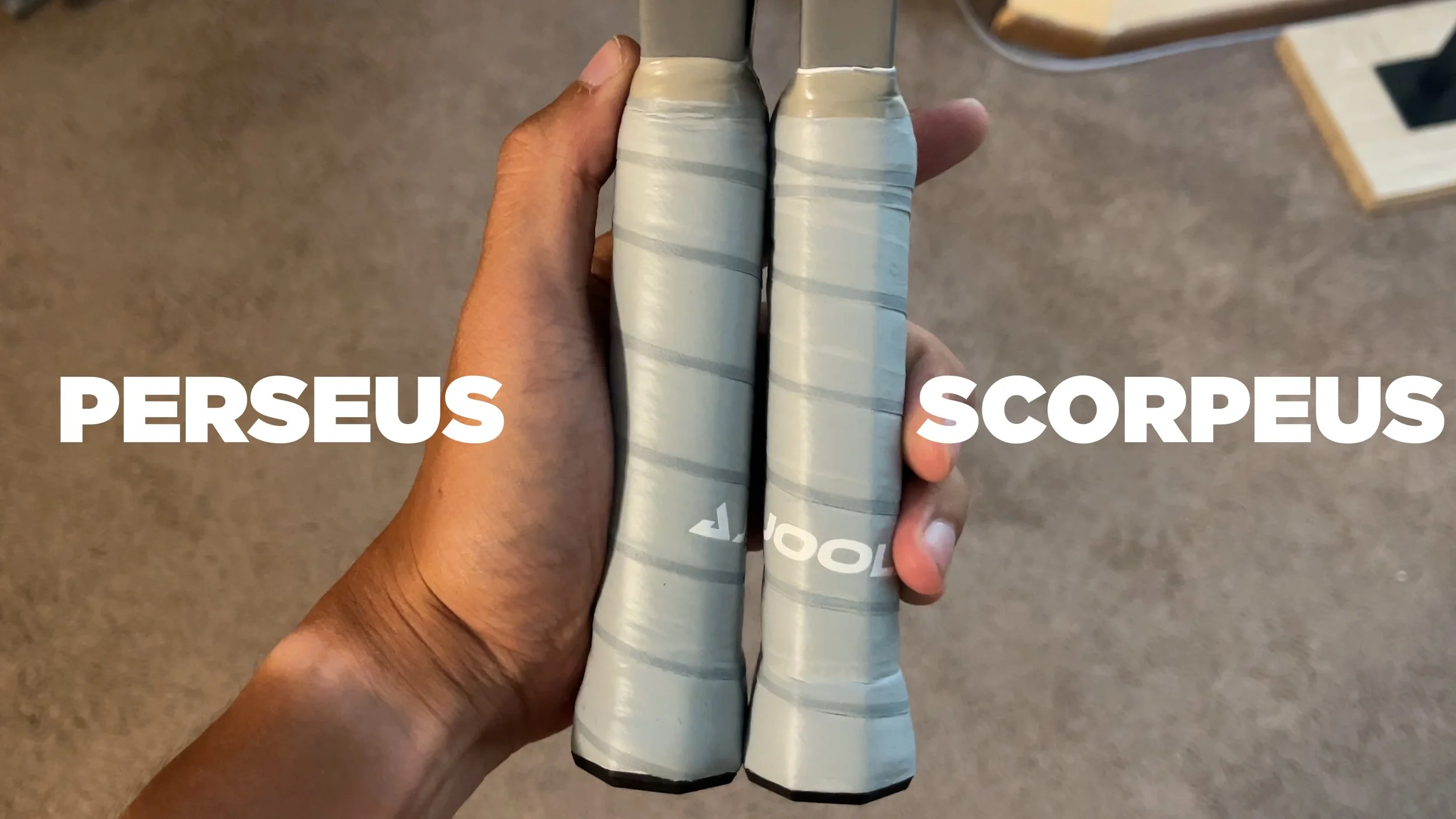 Joola Perseus and Scorpeus pickleball paddle handle length comparison held side by side