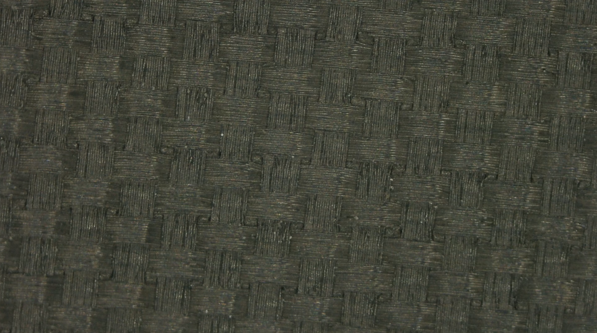 Legacy Pro pickleball paddle carbon fiber weave pattern close-up macro shot