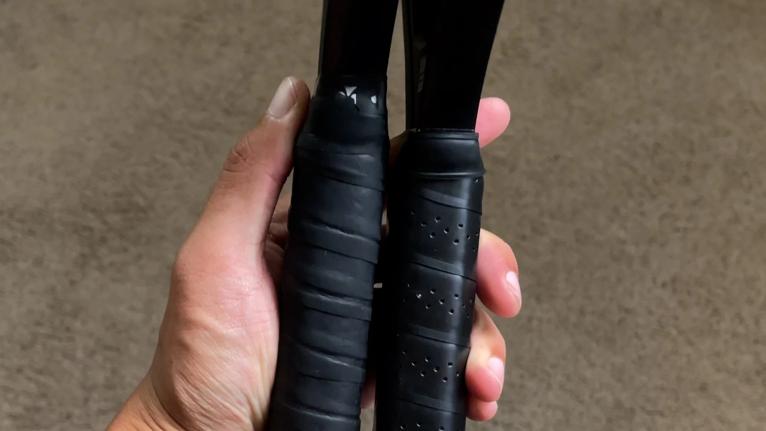 Close-up of Vatic Pro Alchemy pickleball paddle handle tops showing different grip thicknesses Close-up of Vatic Pro Alchemy pickleball paddle handle tops showing different grip thicknesses