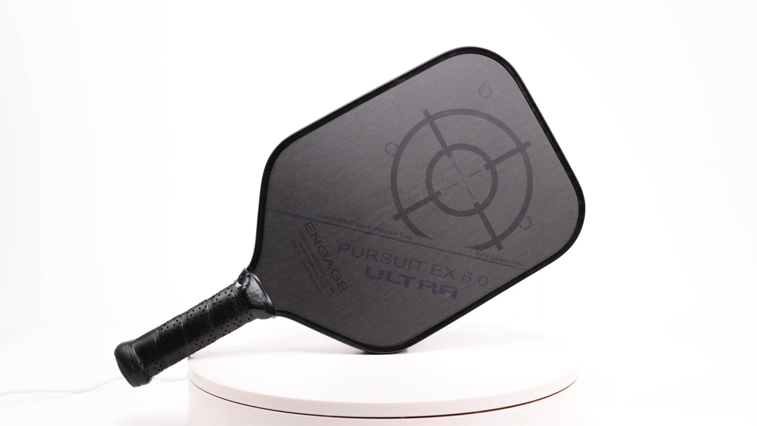 Engage Pursuit EX 6.0 Ultra pickleball paddle on a white turntable display