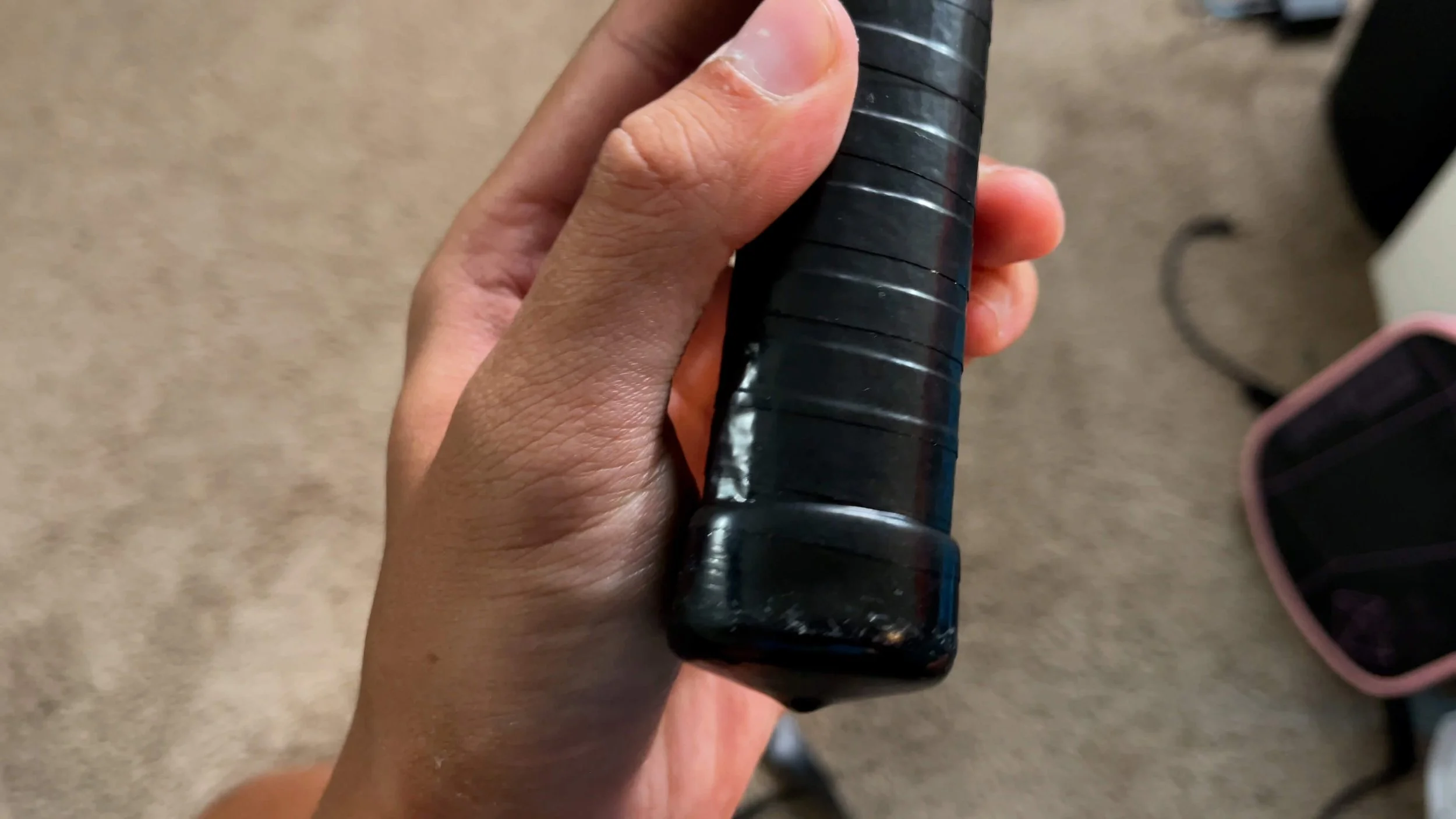 PaddleTek Tempest v3 pickleball paddle stock grip wrapped in black overgrip