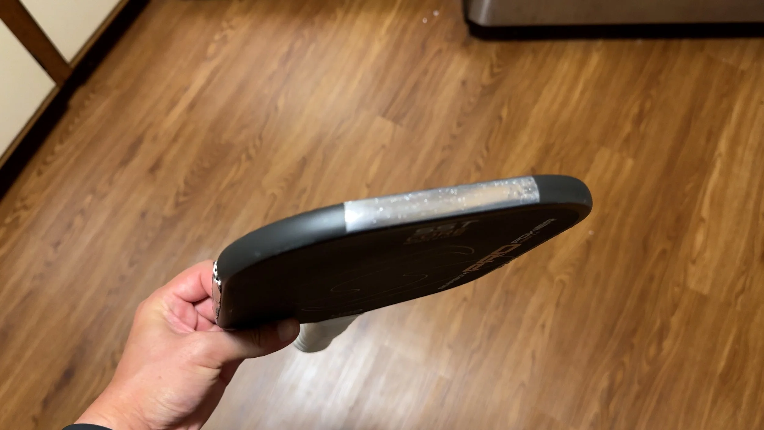 Side profile of Gearbox Pro Power pickleball paddle showing lead tape placement on the edge