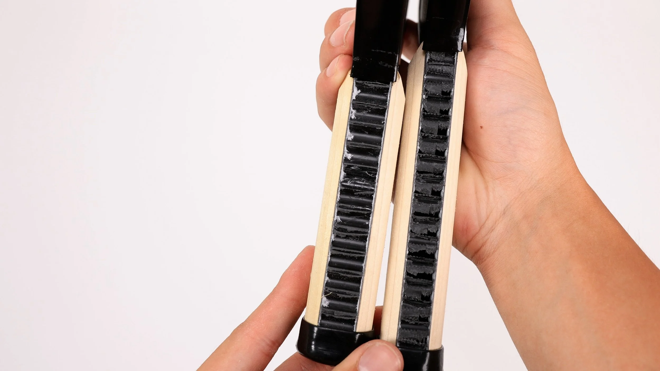 Cross-section comparison of two Engage pickleball paddles showing internal honeycomb core layers