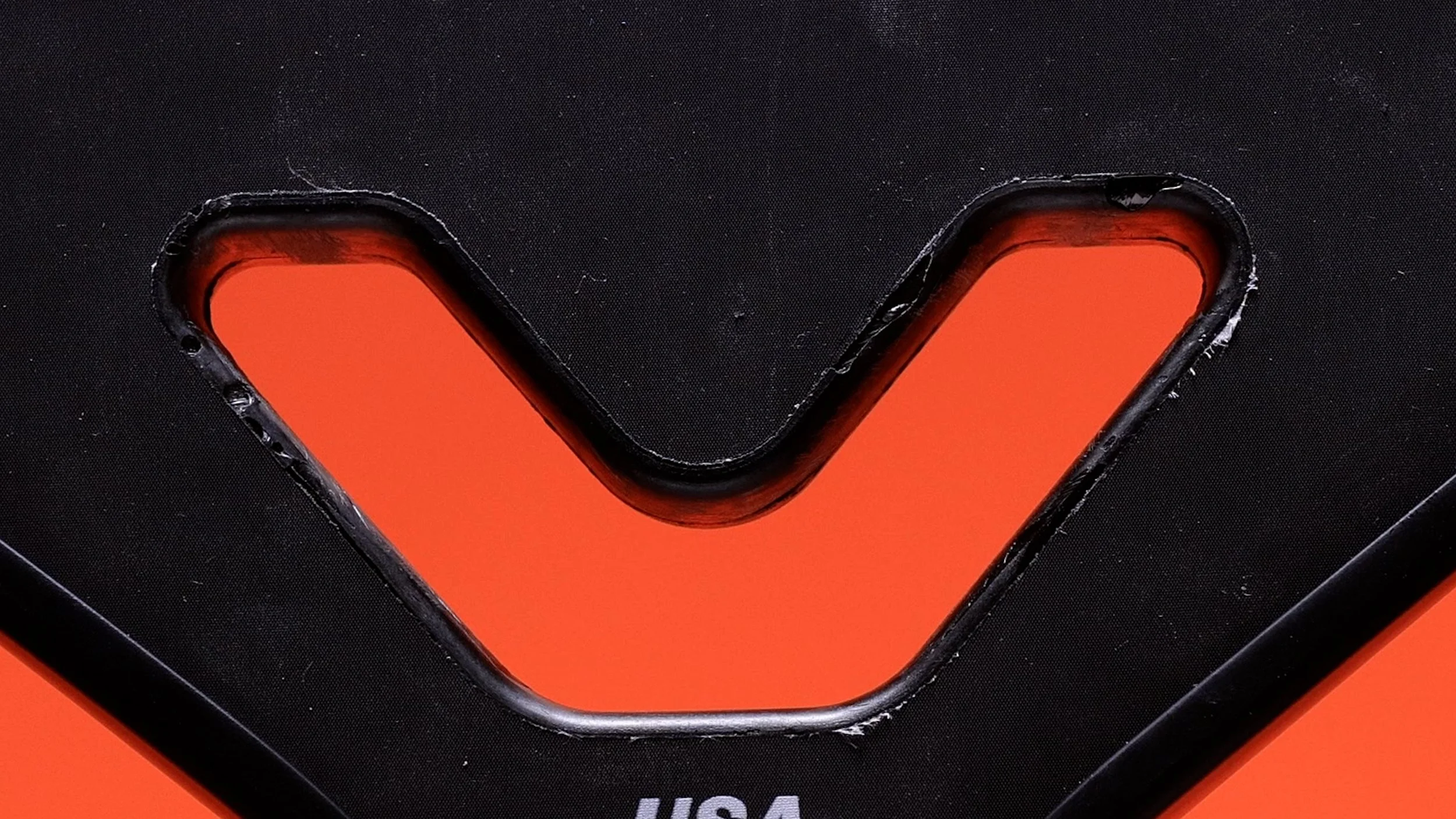 Close-up of Vatic Pro Alchemy pickleball paddle V-shaped throat hole detail Close-up of Vatic Pro Alchemy pickleball paddle V-shaped throat hole detail