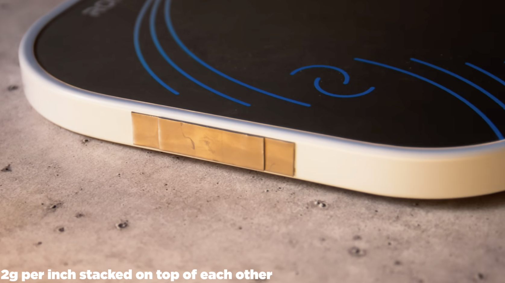 Ronbus Quanta pickleball paddle edge close-up showing lead tape placement at 2g per inch stacked
