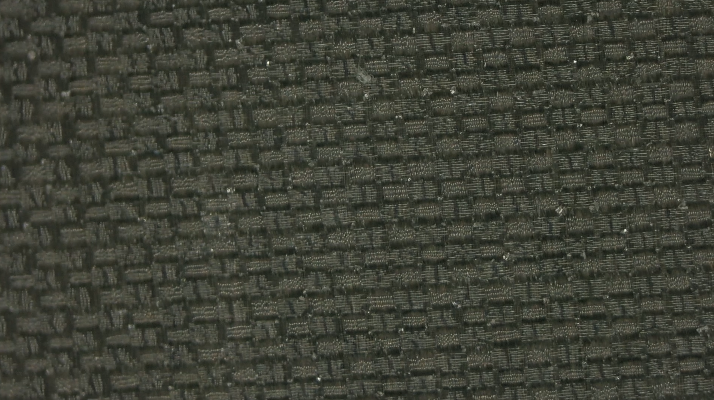 Legacy Pro pickleball paddle carbon fiber surface texture detail at high magnification