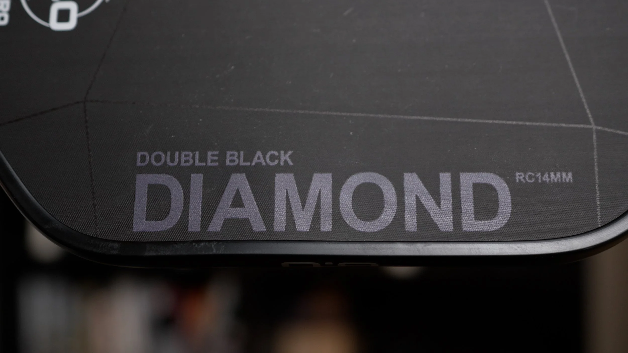 Six Zero Double Black Diamond RC14MM pickleball paddle close-up showing model designation on face