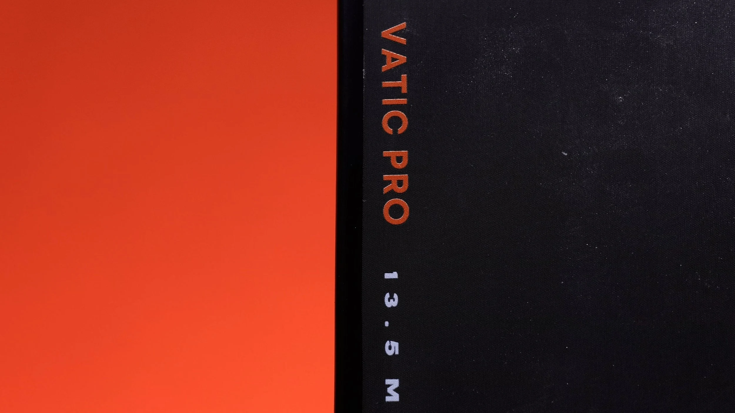 Close-up of Vatic Pro Alchemy pickleball paddle edge showing 13.5mm thickness marking Close-up of Vatic Pro Alchemy pickleball paddle edge showing 13.5mm thickness marking