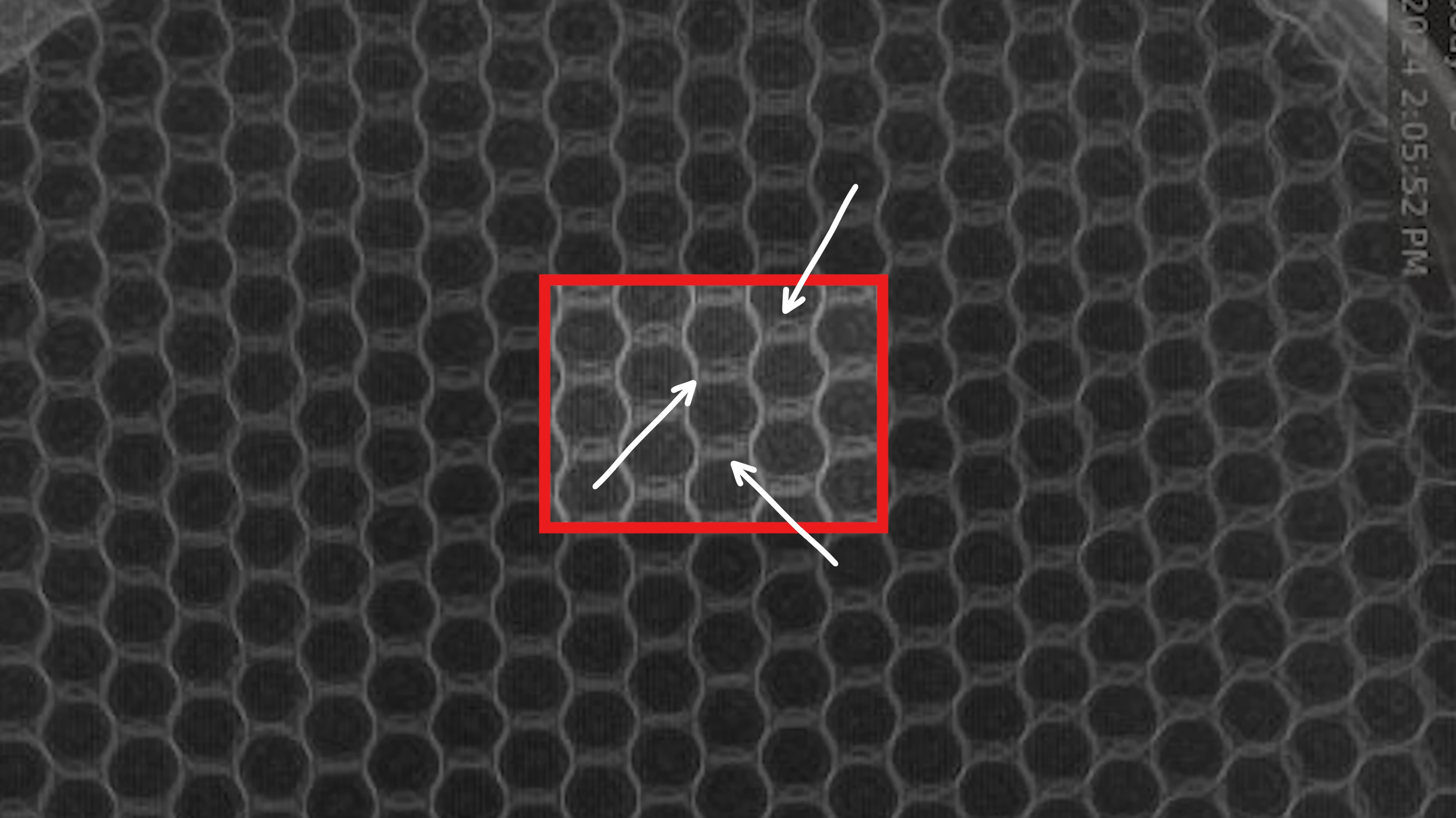 X-ray scan of Vatic Pro Saga honeycomb core showing crushed cells highlighted with red box and arrows