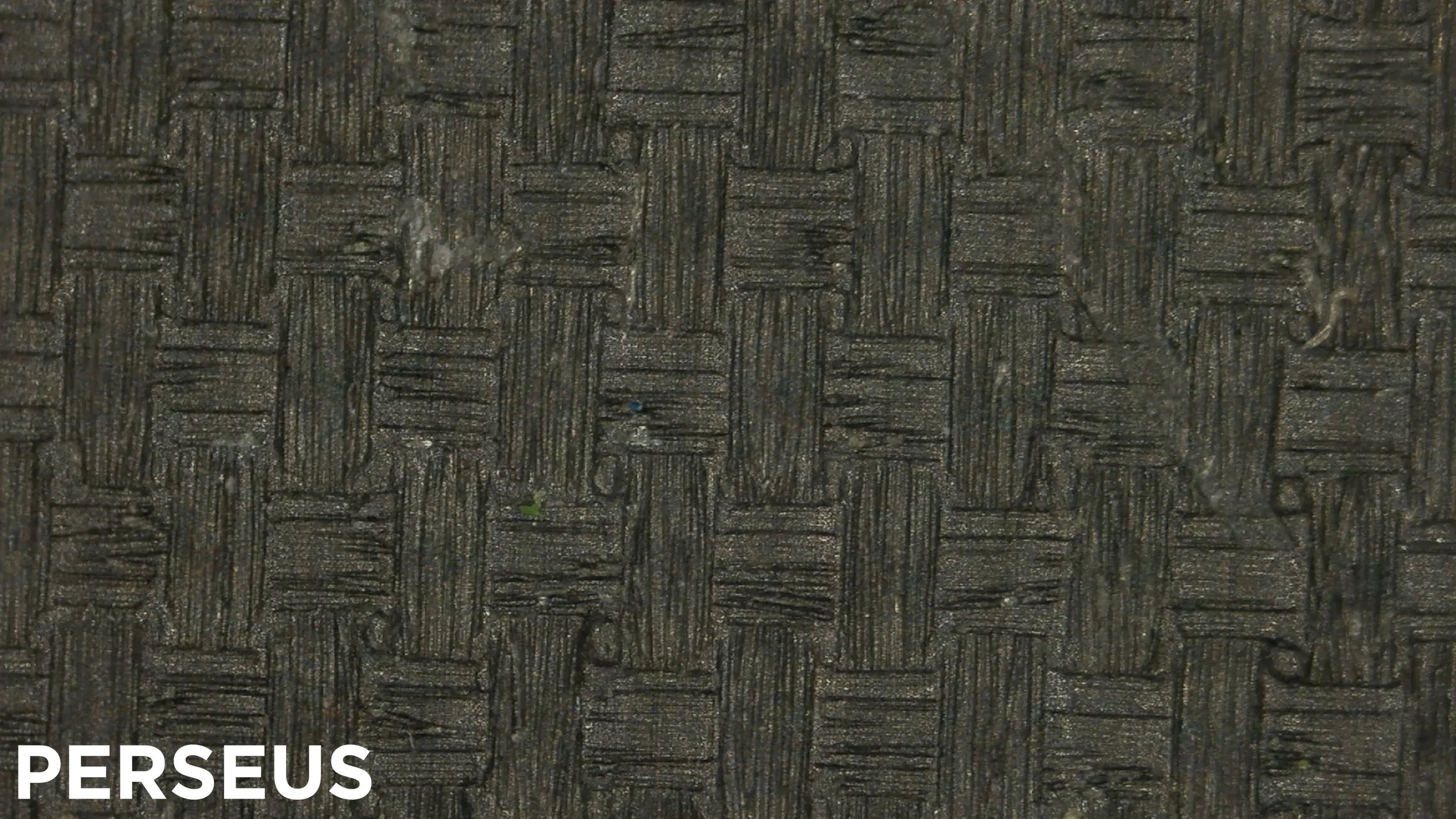 Macro close-up of JOOLA Ben Johns Perseus pickleball paddle carbon friction surface texture