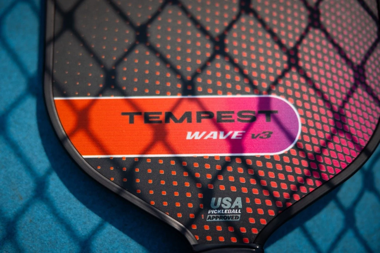 PaddleTek Tempest Wave v3 pickleball paddle face close-up showing gradient dot pattern and USA Pickleball approved stamp