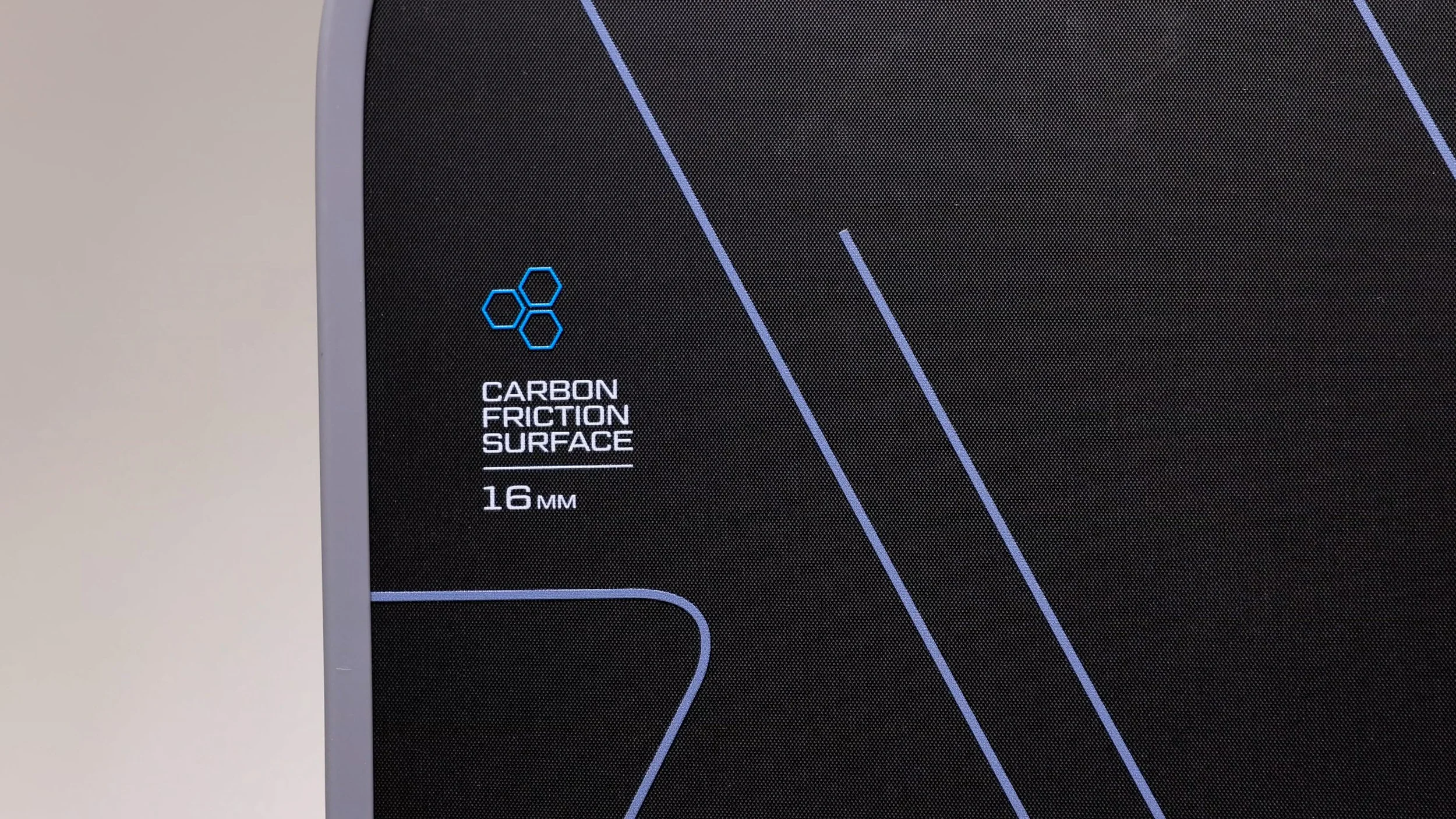 Joola Scorpeus pickleball paddle carbon friction surface detail showing 16mm core thickness