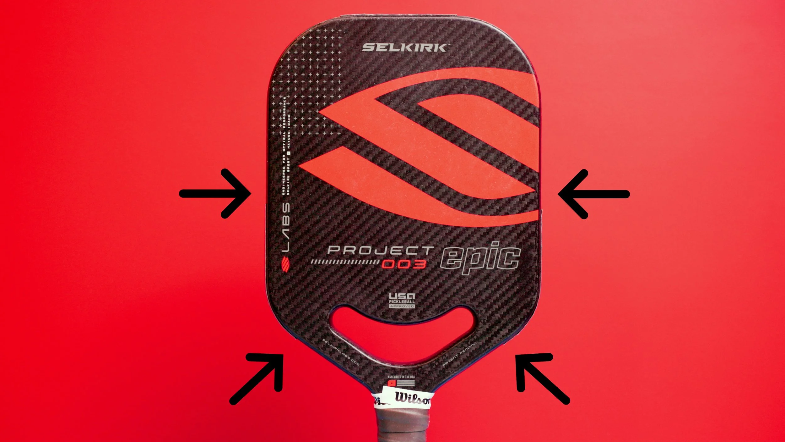 Selkirk Labs Project 003 Epic pickleball paddle with arrows highlighting key design features on red background