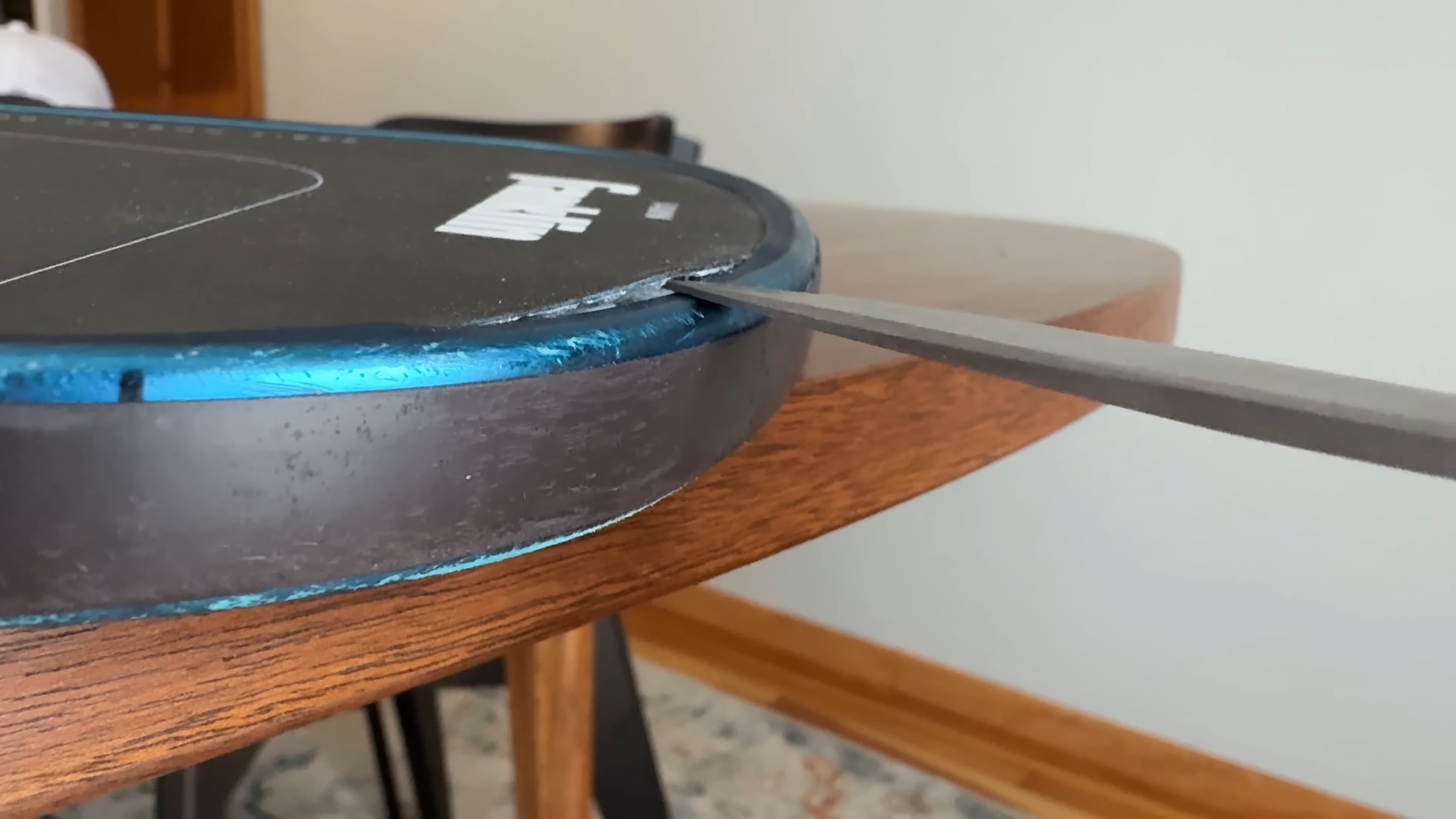 Franklin C45 pickleball paddle delamination issue showing face separating from the foam edge wall