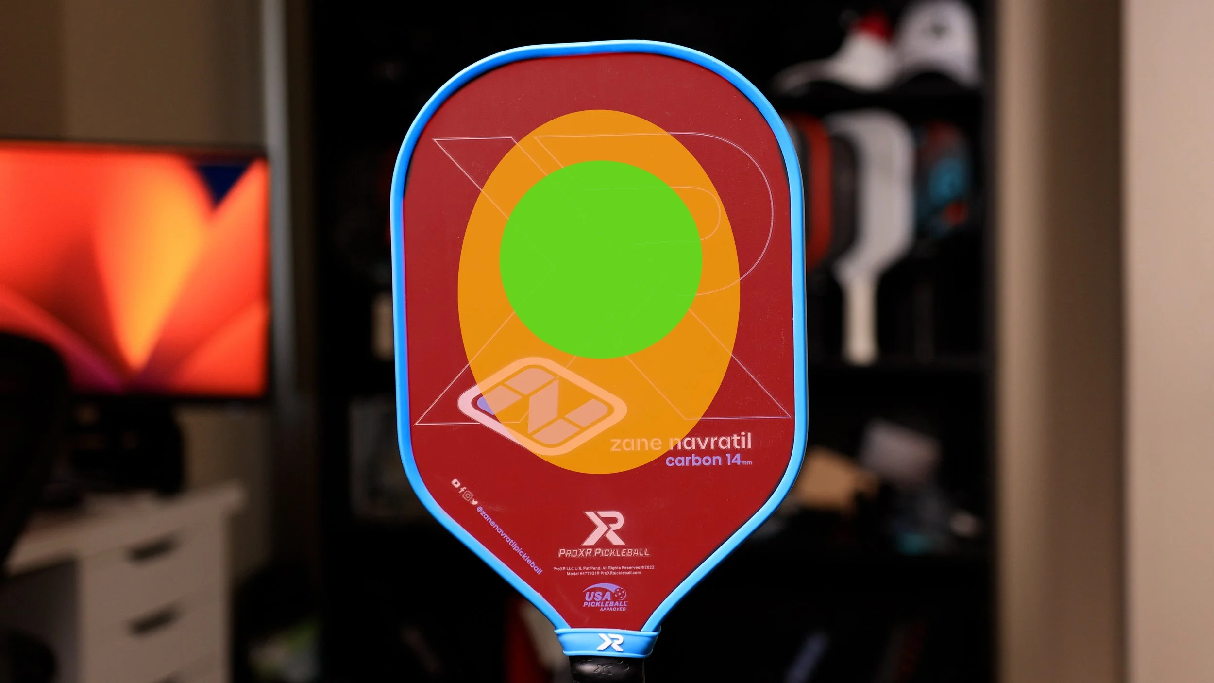 ProXR Zane Navratil Carbon 14 pickleball paddle with sweet spot heat map overlay showing green center