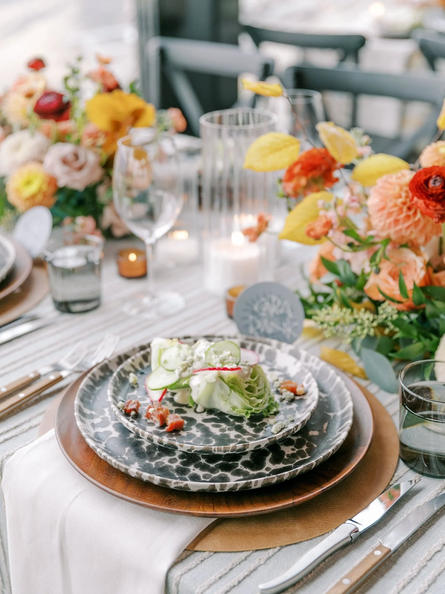 The perfect Fall color palette with hints of western chic &mdash; florals ablaze in amber and crimson, linens flowing like art, and layered textures that frame an editorial tablescape. 

Set high above Snow King with the Tetons beyond, every detail i