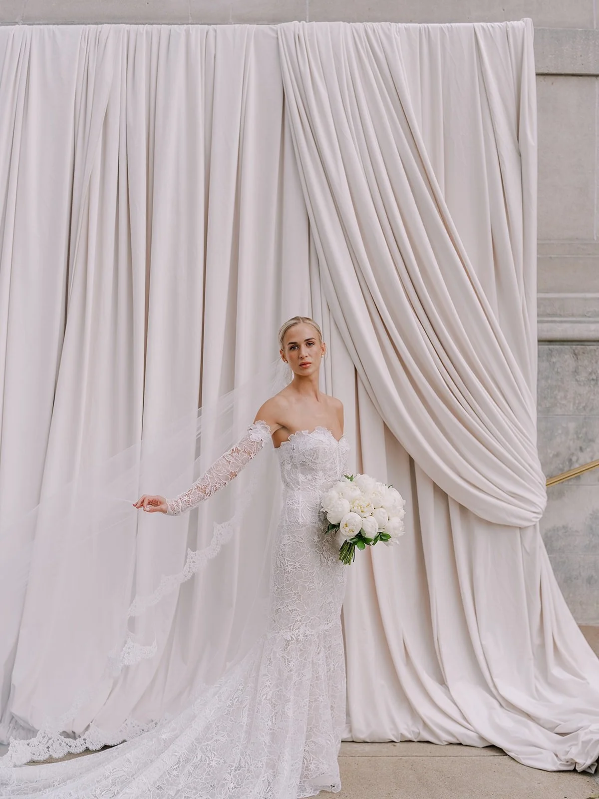 Call it intuition or impeccable taste, but our bride Annie walked into her wedding day already aligned with the biggest 2026 bridal trends - long lace sleeves, sculptural silhouettes, luxe draping, and an overall aesthetic that blends fashion-forward