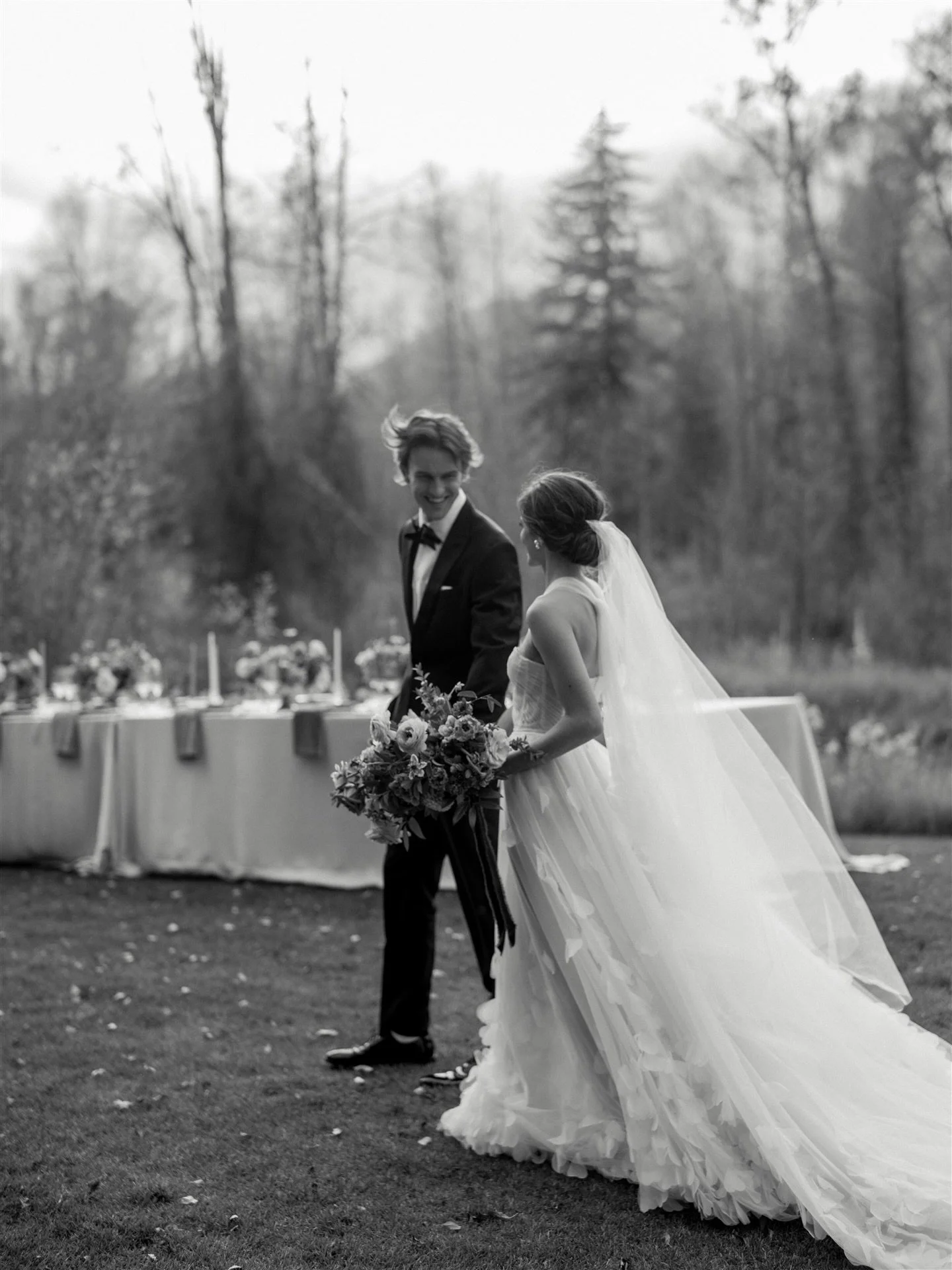 The in between moments caught in black and white. We love the way the details on this gorgeous @lizmartinezbridal dress dances with movement. This dress paired beautifully with the magical yellow Aspen leaves that danced in the soft Rocky Mountain br