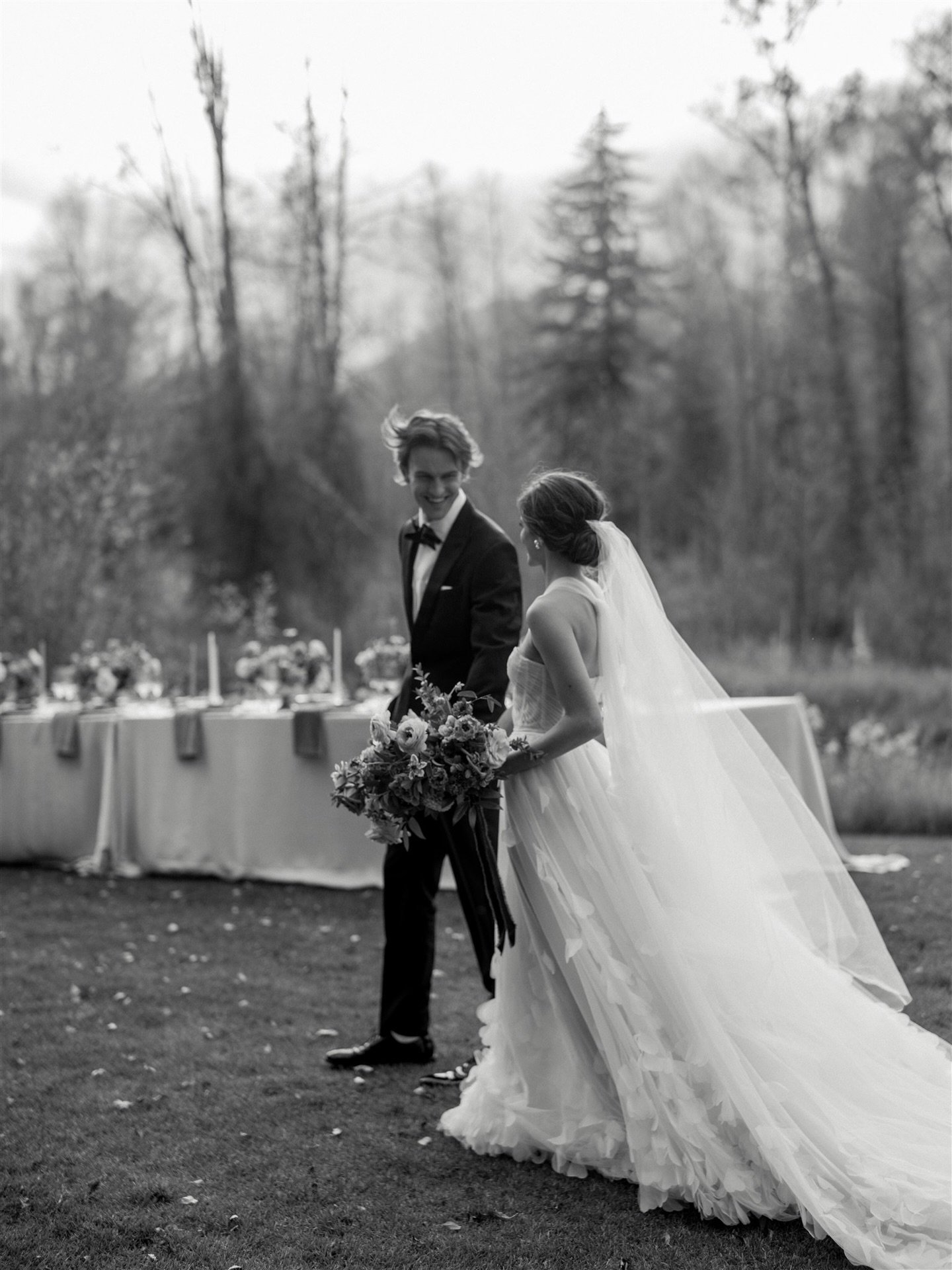 The in between moments caught in black and white. We love the way the details on this gorgeous @lizmartinezbridal dress dances with movement. This dress paired beautifully with the magical yellow Aspen leaves that danced in the soft Rocky Mountain br