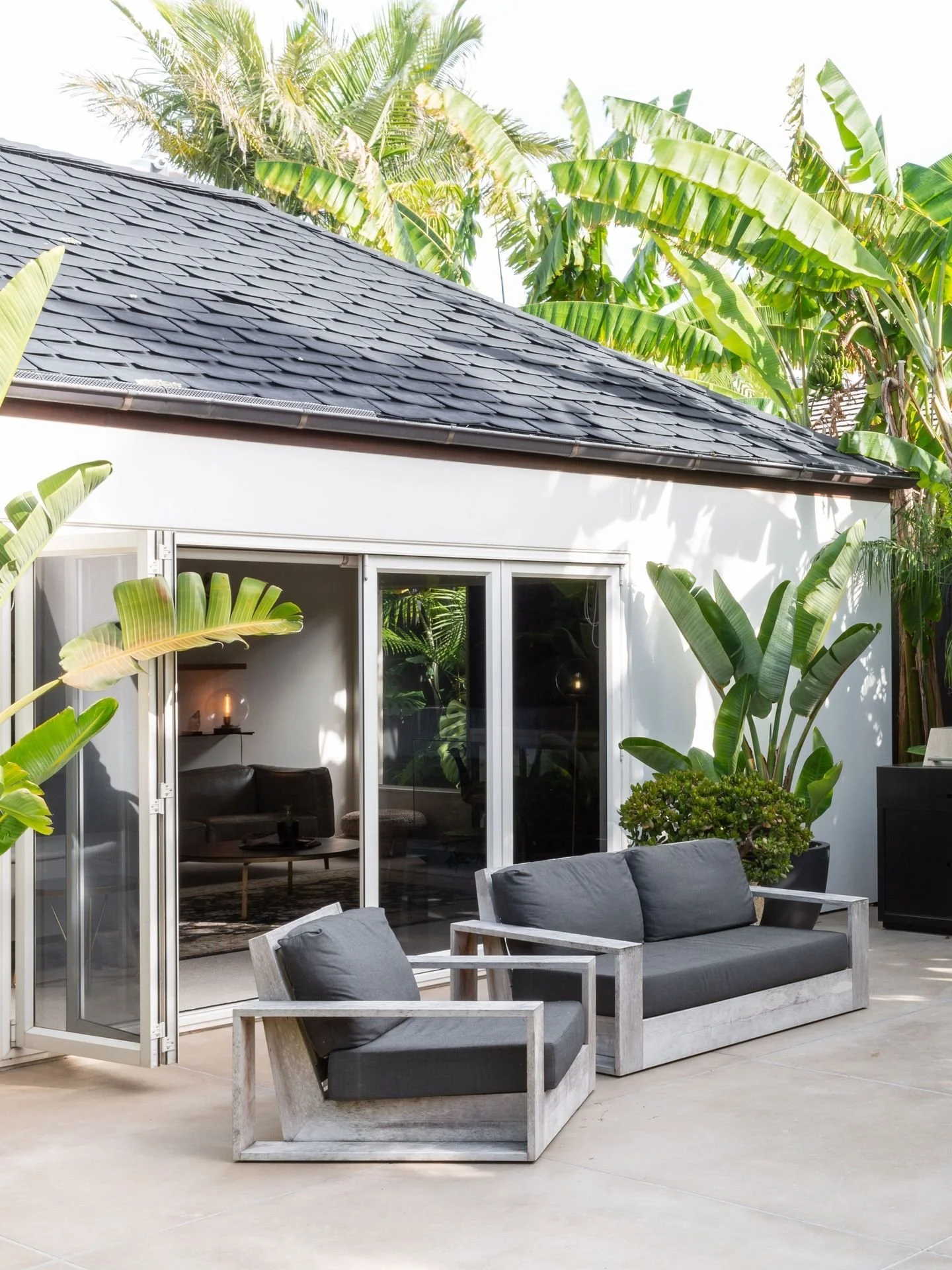 Designed for New Zealand&rsquo;s unpredictable weather, the updated landscaping means no muddy footprints through the house + the kids can still play freely. When winter settles in, the outdoor fire and built in grill turn the space from &ldquo;just 