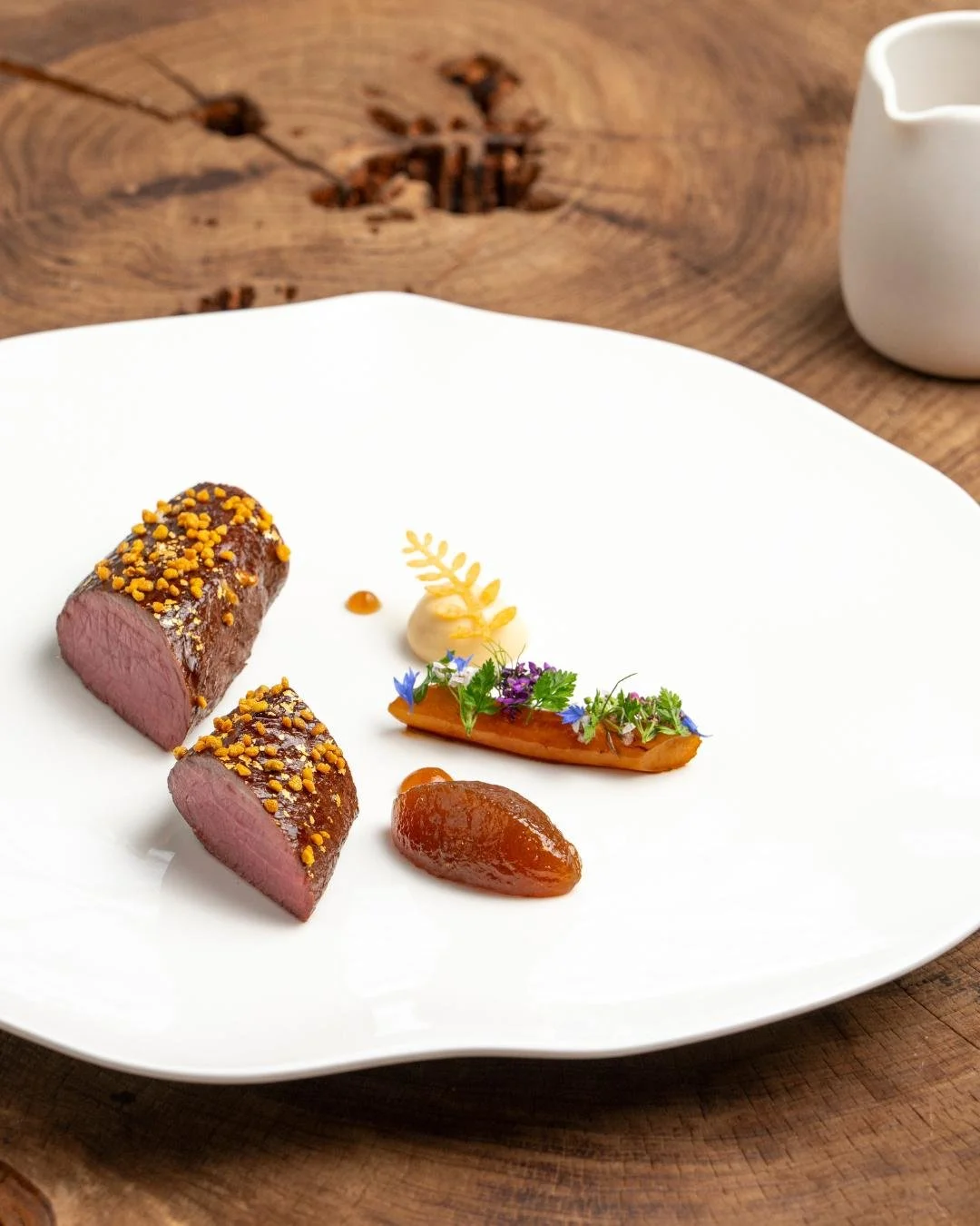 Sourced from the rolling landscapes of Devon @curtispittsdeerservices 

Passed down through generations, their knowledge of game and land shapes every detail of this dish. Roasted to a delicate blush and sealed in flavour-rich fats, the venison captu