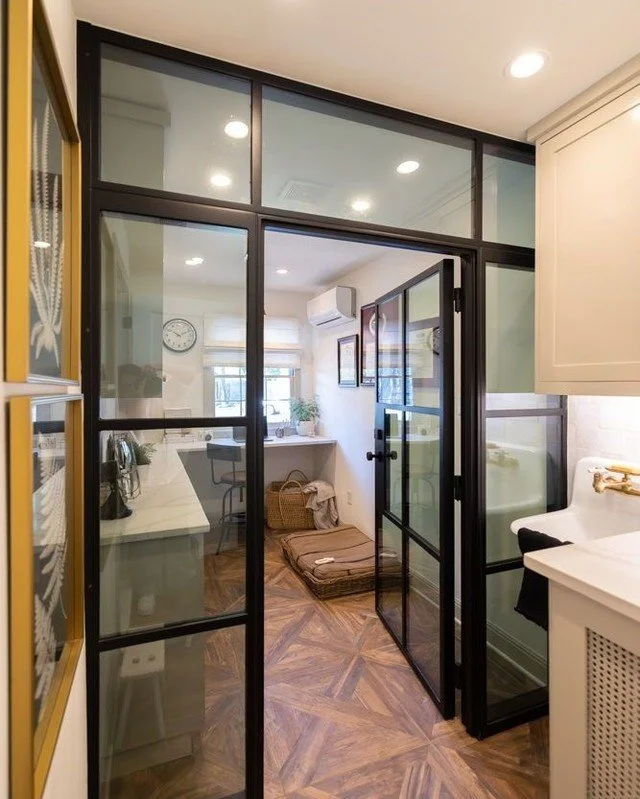 We installed this gorgeous metal frame door to section off a new home office in our Far West project. Not only did the door create two distinct spaces but it allowed natural light to flow from one &quot;room&quot; to the other and looks so good doing