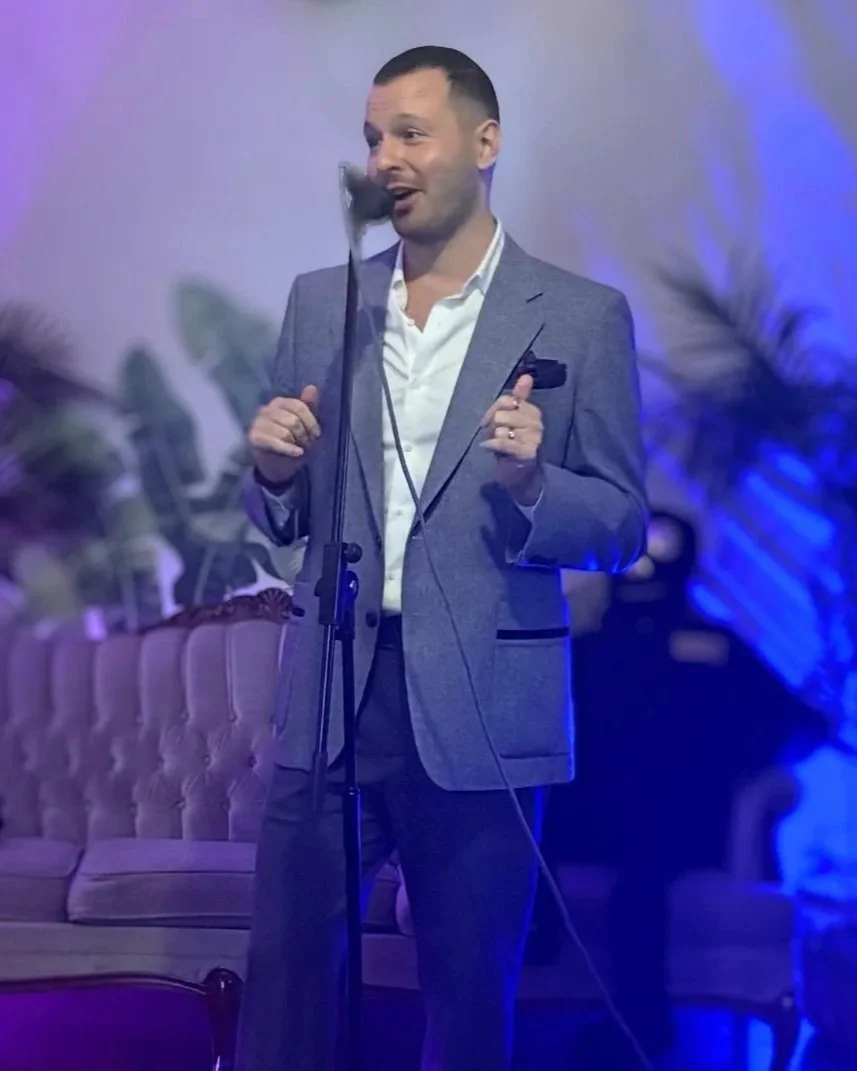 Andrew Charles Edwards, co-founder and CEO of designACE, hosting an event.