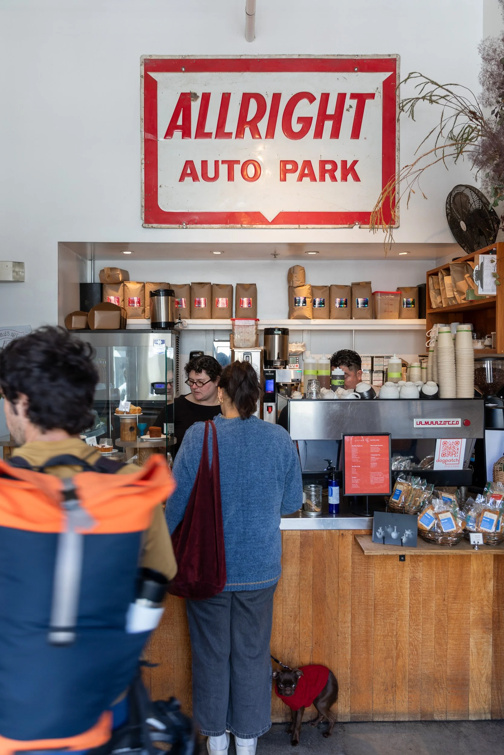 A line of customers inside Piccino Coffee Bar in San Francisco's Dogpatch